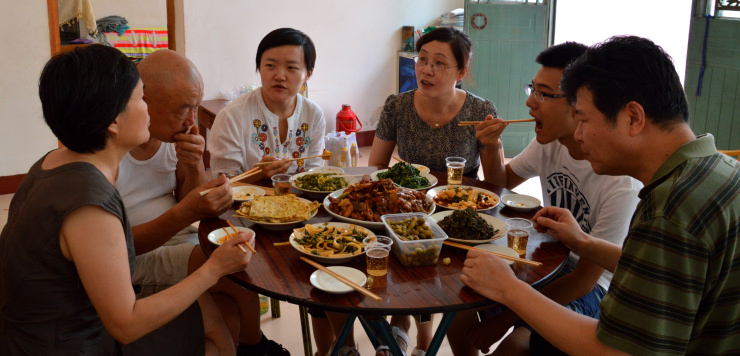 China: A Chinese urban family takes a meal in a one-table-restaurant in a small village near Baoji, Shaanxi. Such activities are a typical entry-level activity for farmers to get additional income.