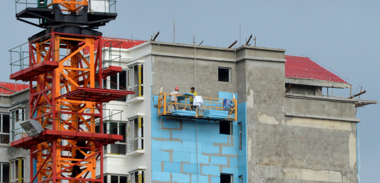 Tibet: Thermic insulation panels are fitted on a residential building in Hezuo, Gansu province.